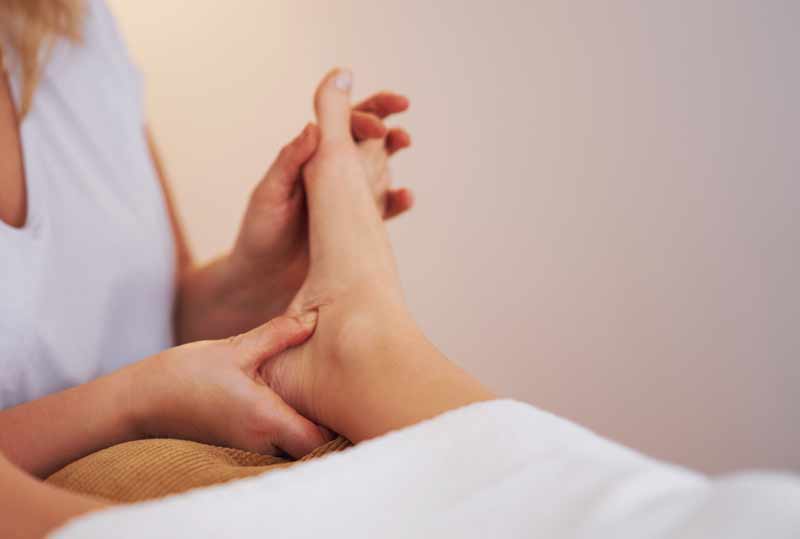 massage pied réflexologue